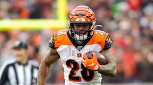 Dec 8, 2019; Cleveland, OH, USA; Cincinnati Bengals running back Joe Mixon (28) runs the ball past Cleveland Browns cornerback Juston Burris (31) during the fourth quarter at FirstEnergy Stadium. Mandatory Credit: Scott R. Galvin-USA TODAY Sports